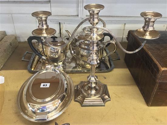 A quantity of silver plated ware including candelabra, tea set, trays etc